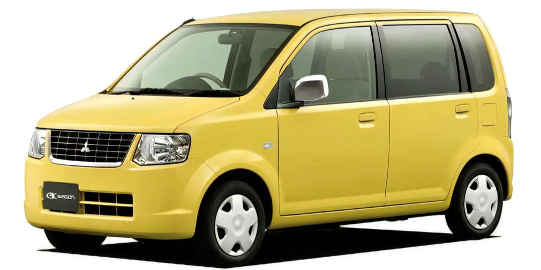 黄色のコンパクトな軽自動車が斜め前方から見える。